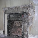Photo:Missing fireplace.