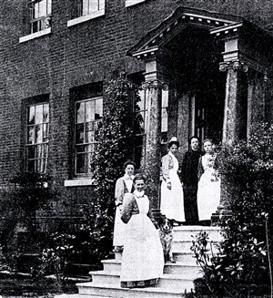Photo:Staff on front steps of Ivy House, c.1909.